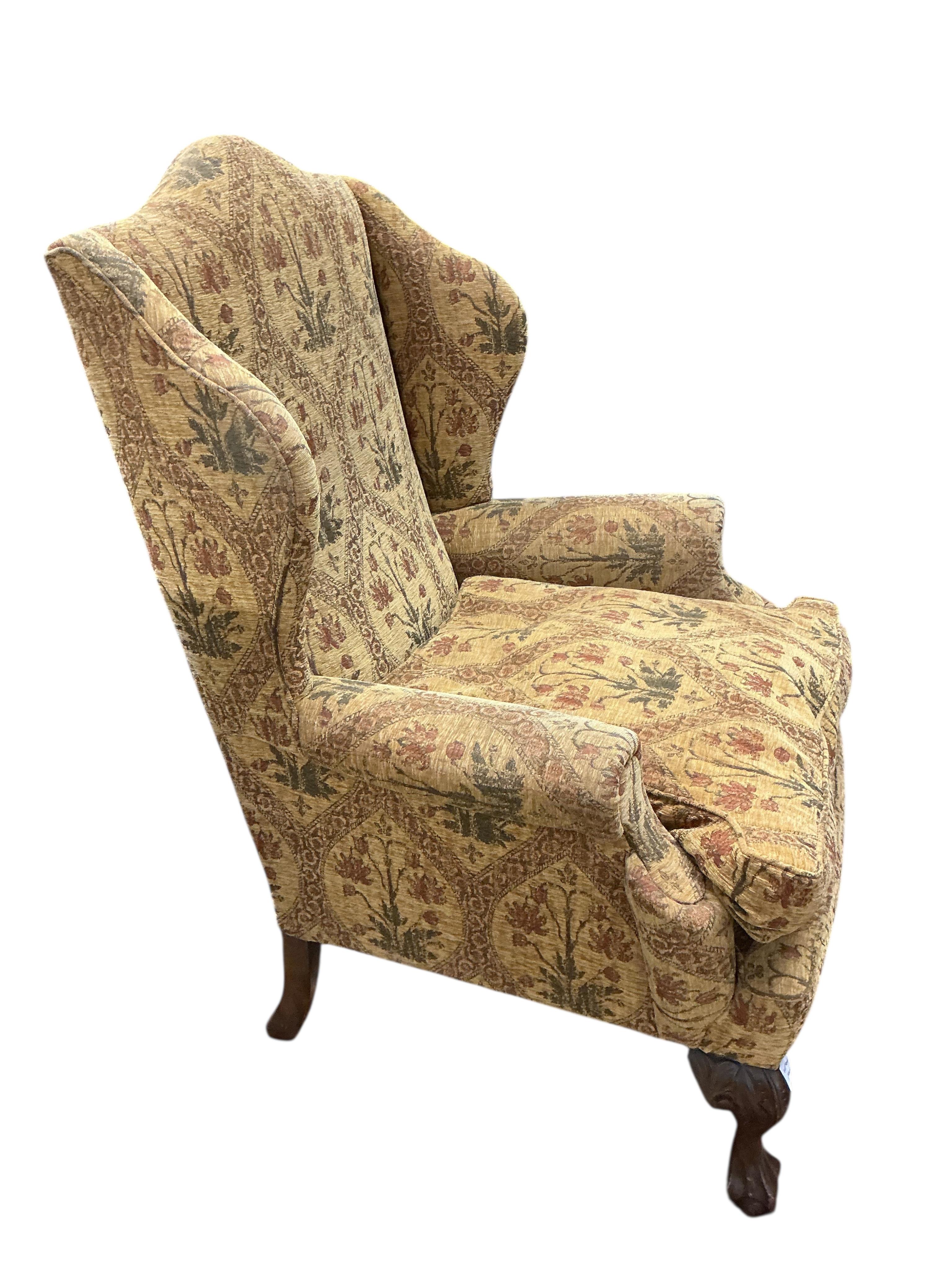 A pair of George III style upholstered wing armchairs, width 86cm, depth 74cm, height 120cm